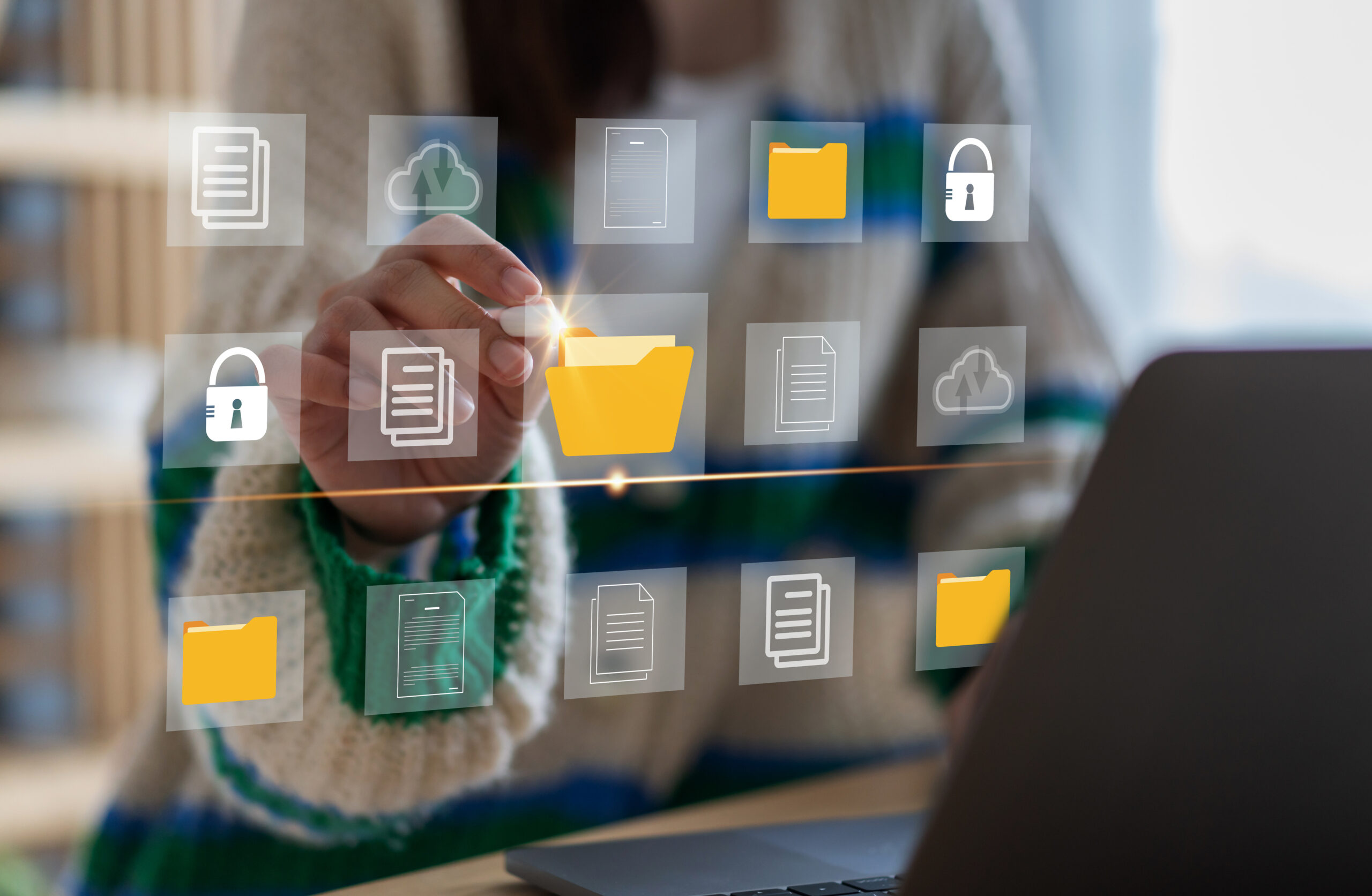 A person interacting with a digital interface displaying icons for folders, documents, and security, representing the functionality of an Electronic Document Management System (EDMS).